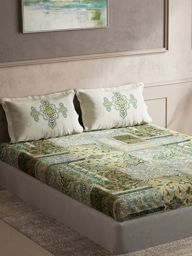 https://cdn.shopify.com/s/files/1/1857/6931/products/a38949b3-b0df-4ef8-b457-de2ddc80fec91696258318064DDecorGreenWhiteEthnicMotifs140TCKingBedsheetwith2PillowCove2.jpg?v=1703241843
